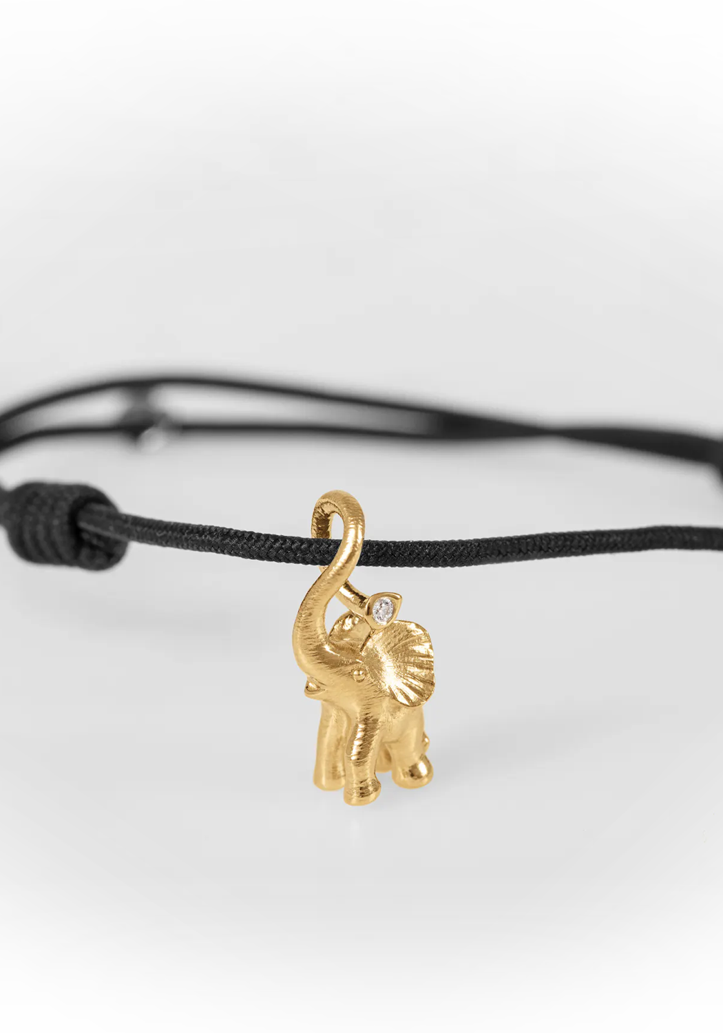 Ole Lynggaard 18KYG Circus Diamond Elephant Charm Cord Bracelet | Ref. A2833-401 | OsterJewelers.com