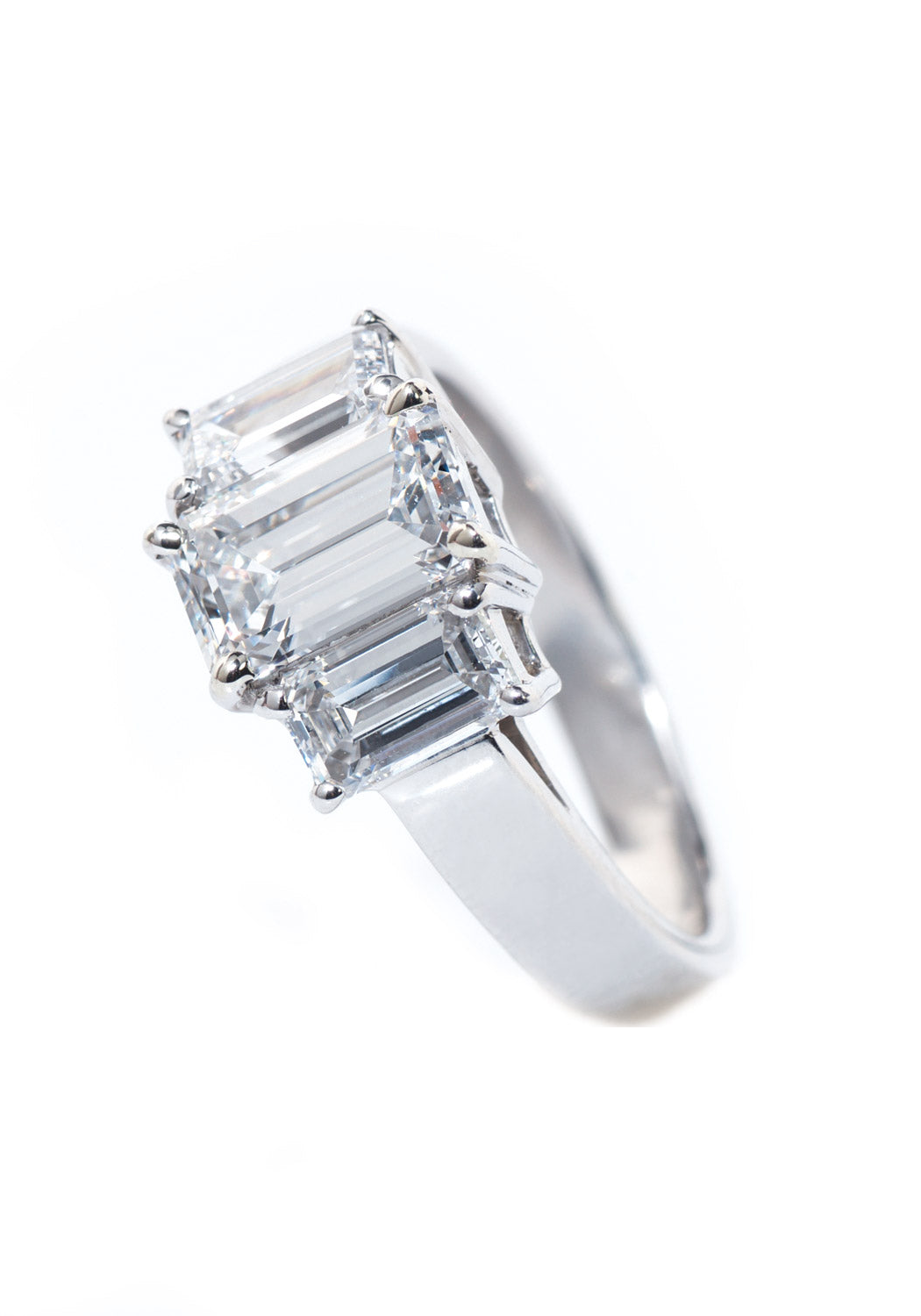 Oster Collection Platinum Trinity Emerald Cut Diamond Ring | OsterJewelers.com